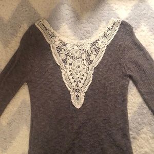 Sweater with lace detail on back